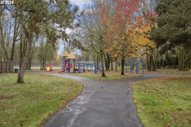 view of playground featuring a lawn