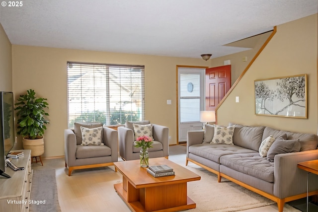 living room with light hardwood / wood-style floors