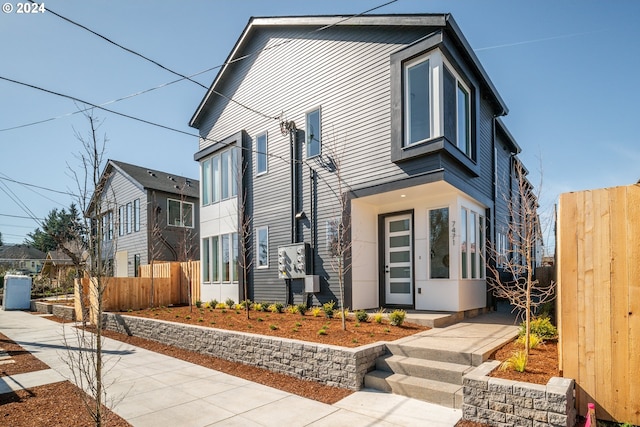 view of front of property with fence