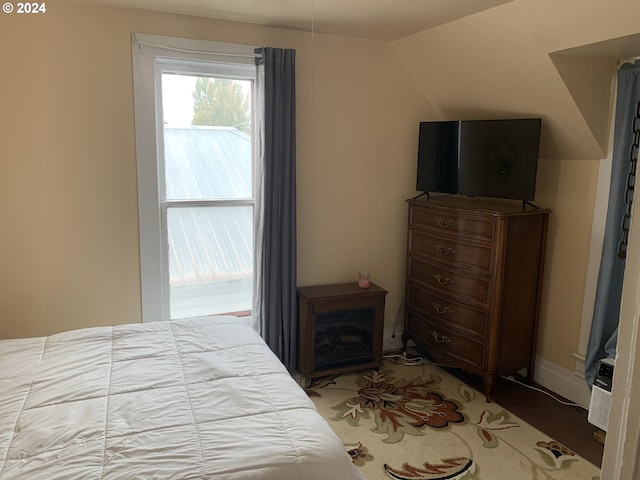 bedroom with vaulted ceiling