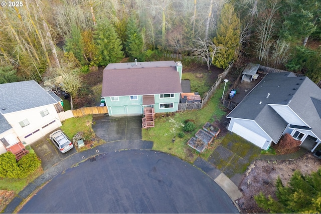 aerial view with a wooded view