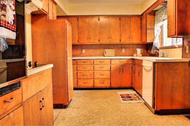 kitchen with decorative backsplash and sink