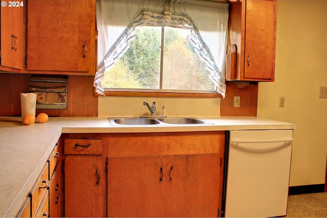 kitchen with dishwasher, backsplash, and plenty of natural light