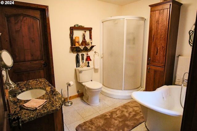 bathroom featuring vanity, independent shower and bath, and tile patterned flooring