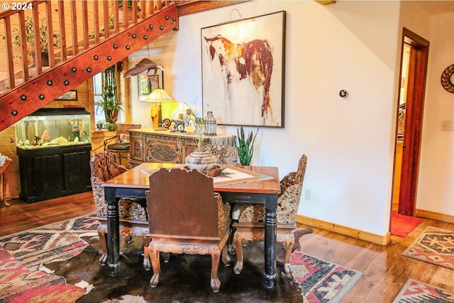 dining room featuring wood-type flooring