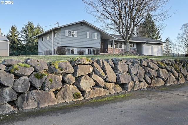 split level home with a garage