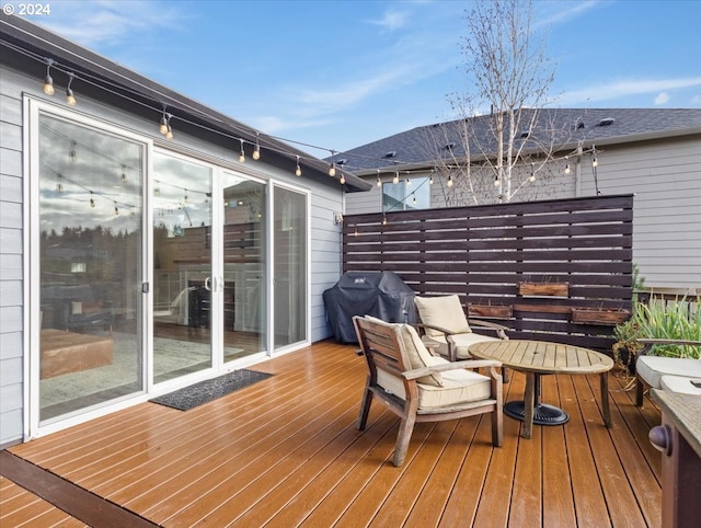 wooden terrace with grilling area