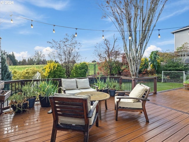 wooden deck with outdoor lounge area