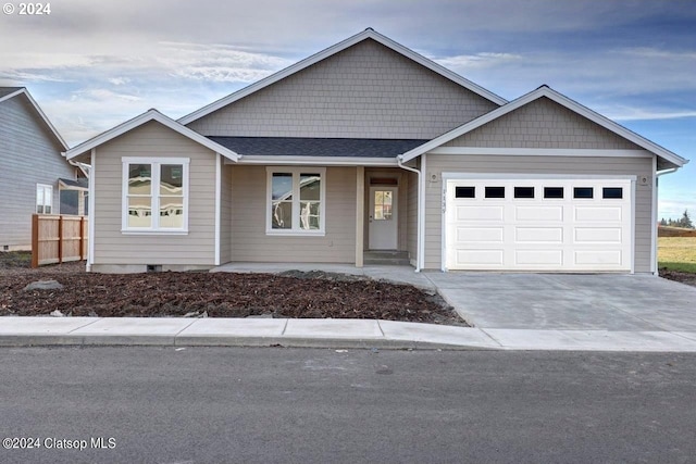 view of front of property featuring a garage