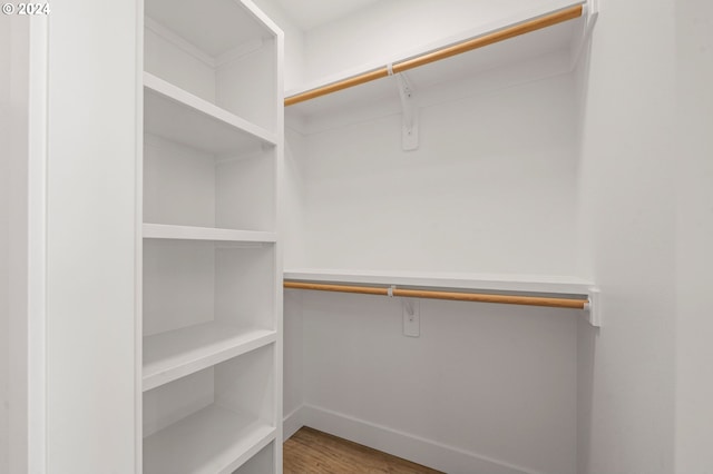 walk in closet featuring hardwood / wood-style floors