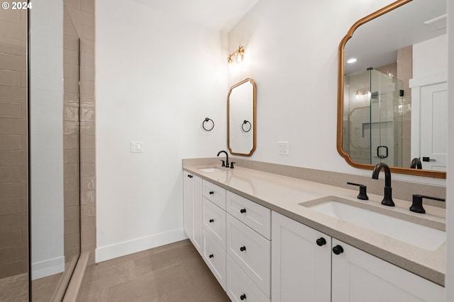 bathroom featuring walk in shower, tile patterned floors, and vanity