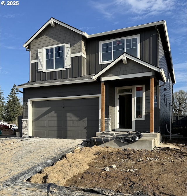 view of front of property with a garage