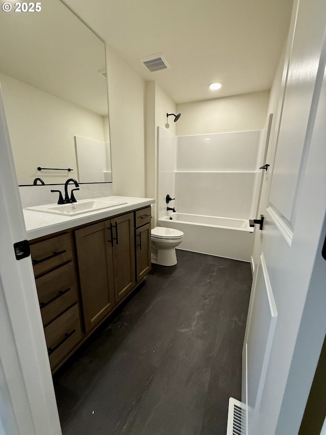 full bathroom featuring vanity, toilet, and  shower combination