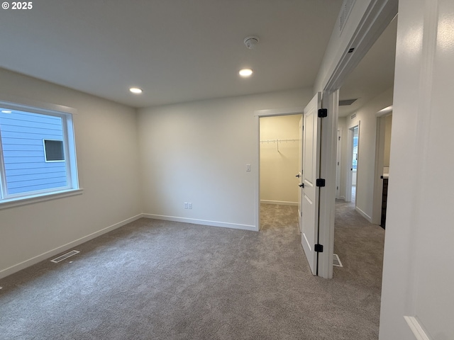 empty room with carpet flooring