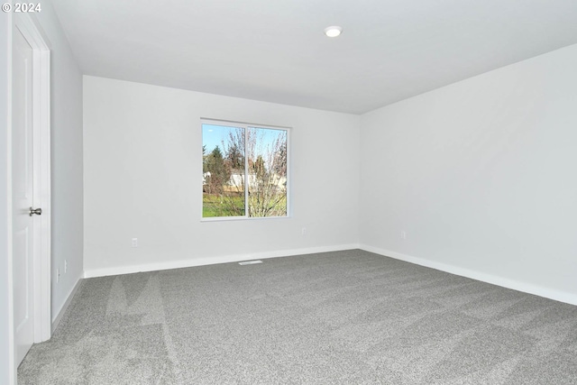 view of carpeted spare room