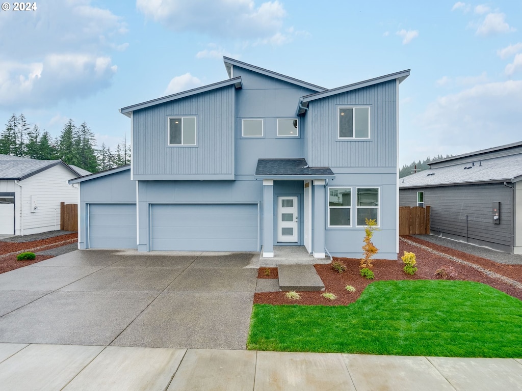 view of front of home with a garage