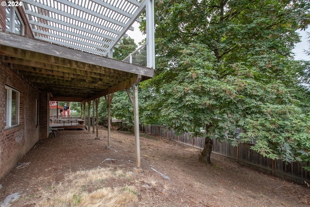 view of yard with a deck