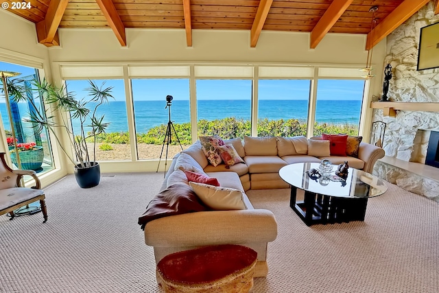 living area with carpet flooring, wooden ceiling, vaulted ceiling with beams, and a premium fireplace