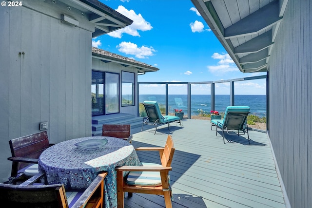 deck featuring a water view