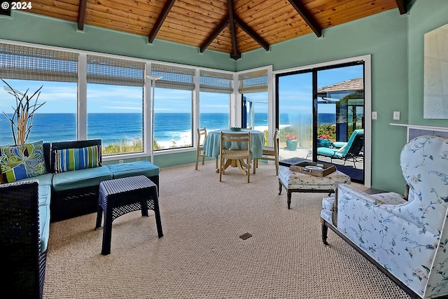 sunroom / solarium featuring lofted ceiling with beams, a water view, and wooden ceiling