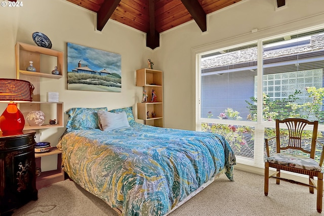 bedroom featuring vaulted ceiling with beams, wood ceiling, and carpet