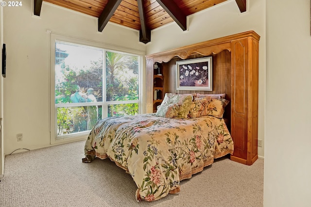 carpeted bedroom featuring wooden ceiling and vaulted ceiling with beams