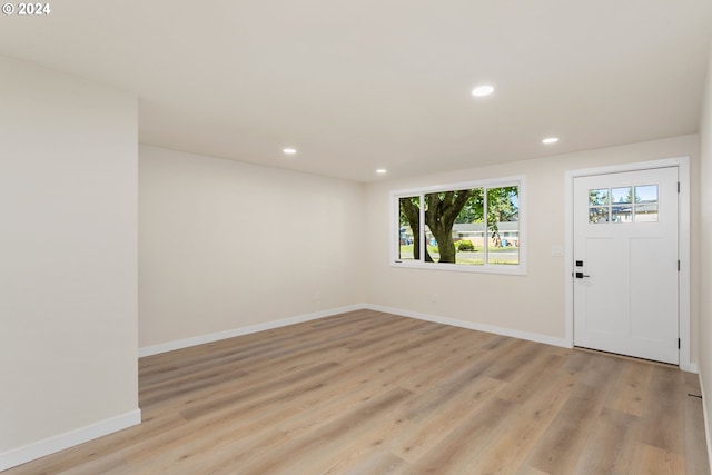 foyer with light wood-type flooring