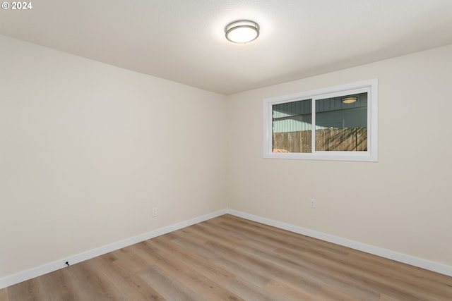 unfurnished room featuring light wood-type flooring