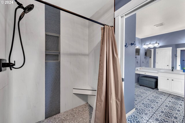 bathroom with vanity and a shower with curtain