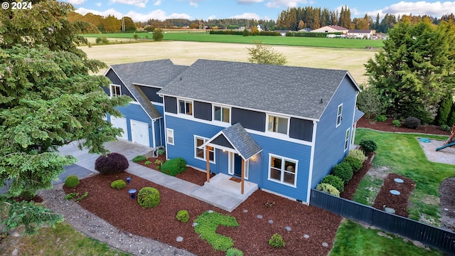 view of front of property featuring a garage