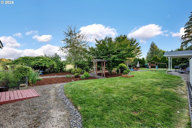 view of yard with a pergola