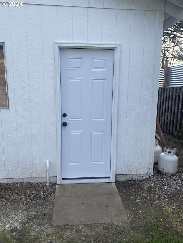 view of home's exterior featuring an outbuilding