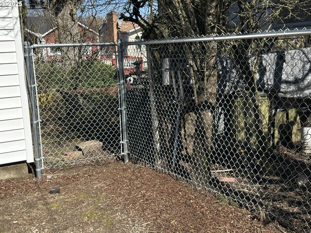 back of property featuring an outbuilding