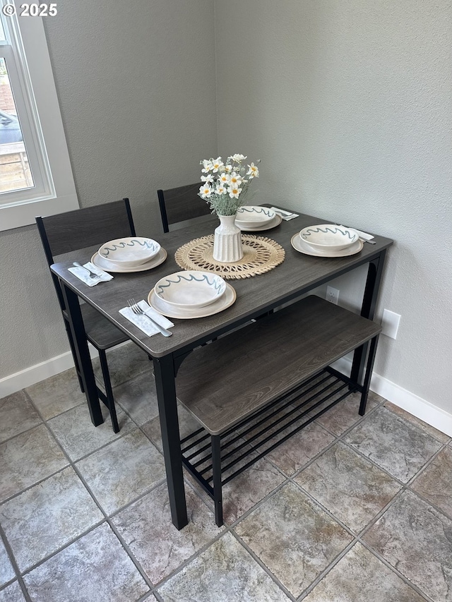 8510 SE Washington St, Portland, OR 97216 - dining room featuring baseboards
