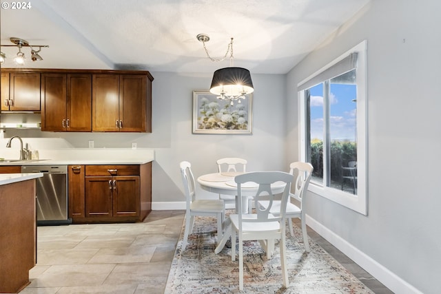 dining room featuring sink