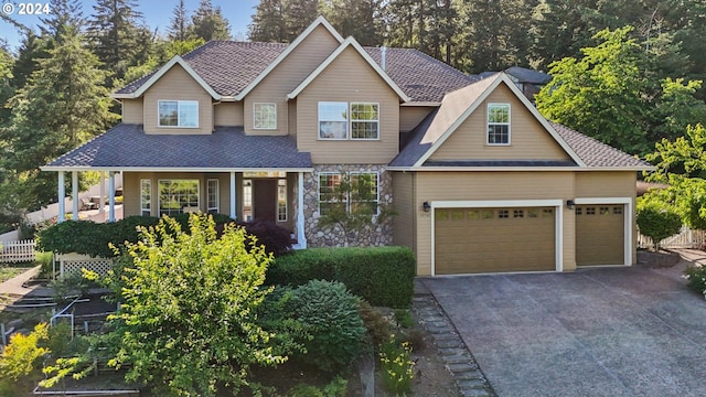 craftsman house with a garage