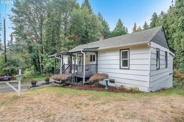 33062 Bellcrest Rd, Scappoose, OR 97056 - ranch-style home with a front lawn, a chimney, and a shingled roof