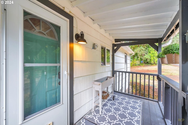 deck with covered porch