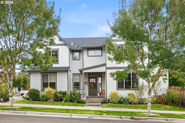 view of front of property with a front lawn