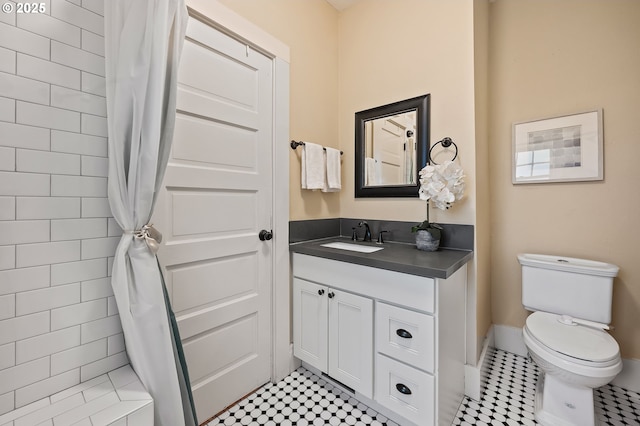 bathroom with vanity and toilet