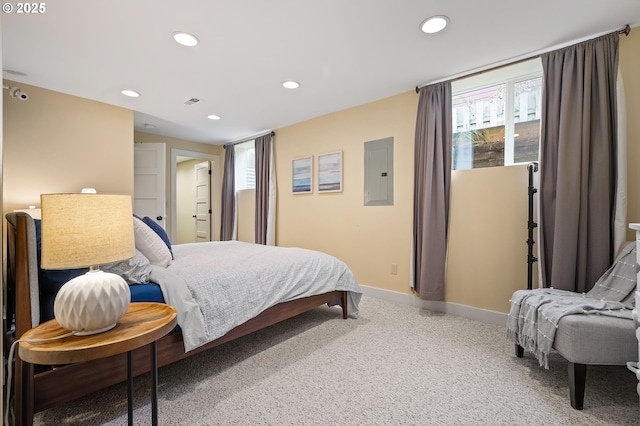 carpeted bedroom with recessed lighting, electric panel, and baseboards