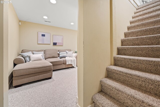 interior space featuring visible vents, carpet flooring, and recessed lighting