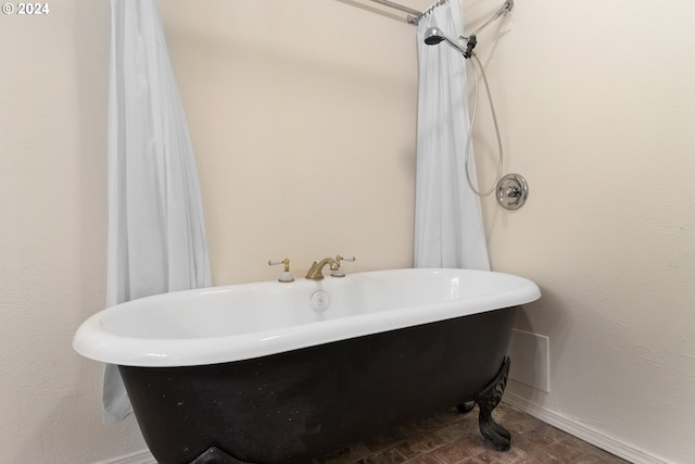 bathroom with a freestanding bath