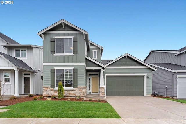 11383 NW 314th Ave, North Plains, OR 97133 - view of front of house featuring board and batten siding, concrete driveway, an attached garage, and stone siding