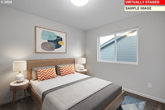 11383 NW 314th Ave, North Plains, OR 97133 - bedroom featuring baseboards and a textured ceiling