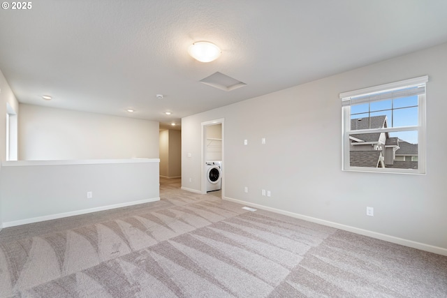 11383 NW 314th Ave, North Plains, OR 97133 - spare room featuring washer / dryer, attic access, light colored carpet, and recessed lighting