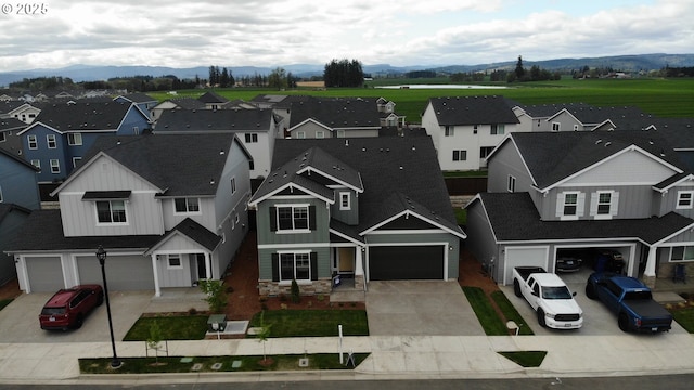 11383 NW 314th Ave, North Plains, OR 97133 - aerial perspective of suburban area featuring a mountain backdrop