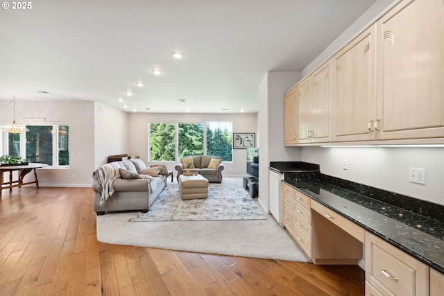 92631 Rainier Ln, Coos Bay, OR 97420 - living area with light wood-style flooring, recessed lighting, and built in desk