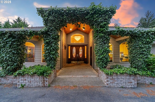 92631 Rainier Ln, Coos Bay, OR 97420 - view of exterior entry at dusk