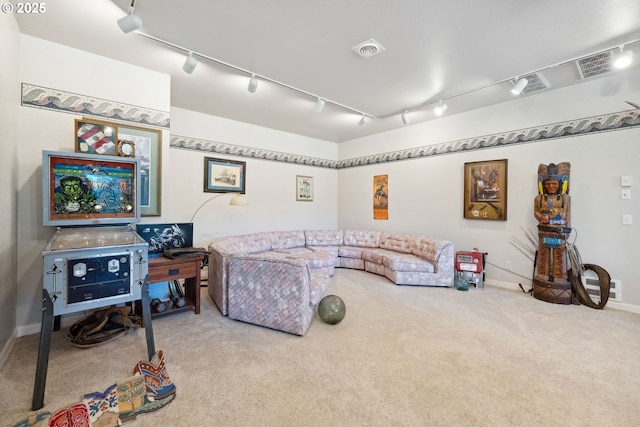 92631 Rainier Ln, Coos Bay, OR 97420 - carpeted living area with rail lighting and baseboards